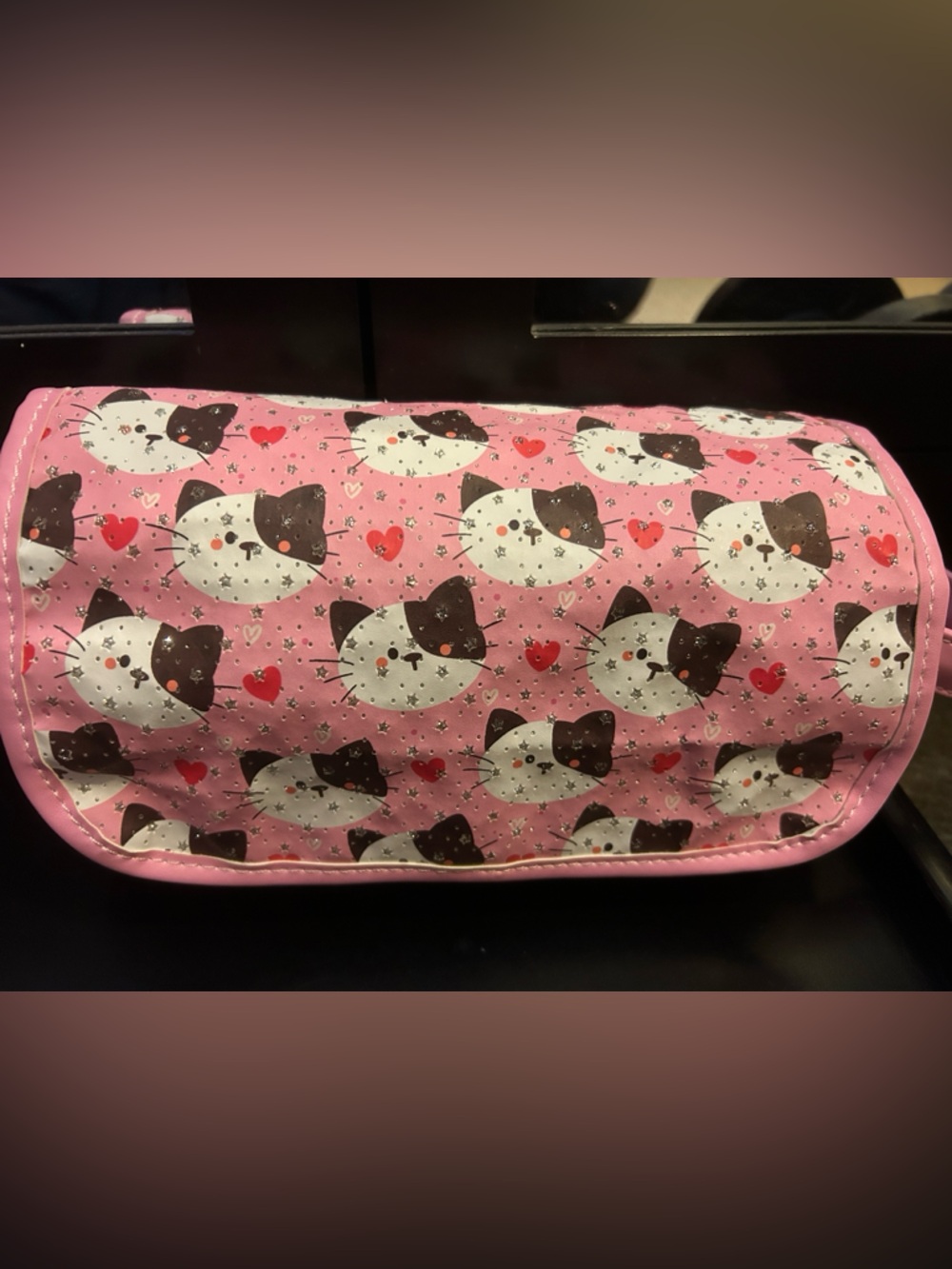 Pink Cat Print rolled up toiletries bag
